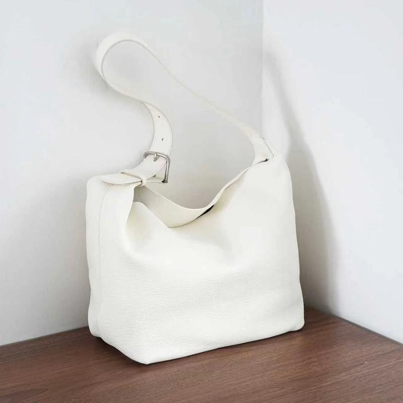 

2025 New Arrival Minimalist Style Hobo Bag Cowhide Soft Leather Single Compartment With Bottom Rivets Handheld Tote Bag 22x23x13cm