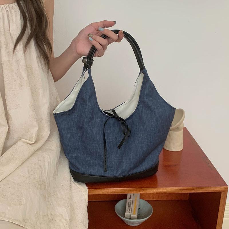 Niche Canvas Casual Tote Bag Women's New Commuter Fashion Handbag Versatile Shoulder Armpit Bag