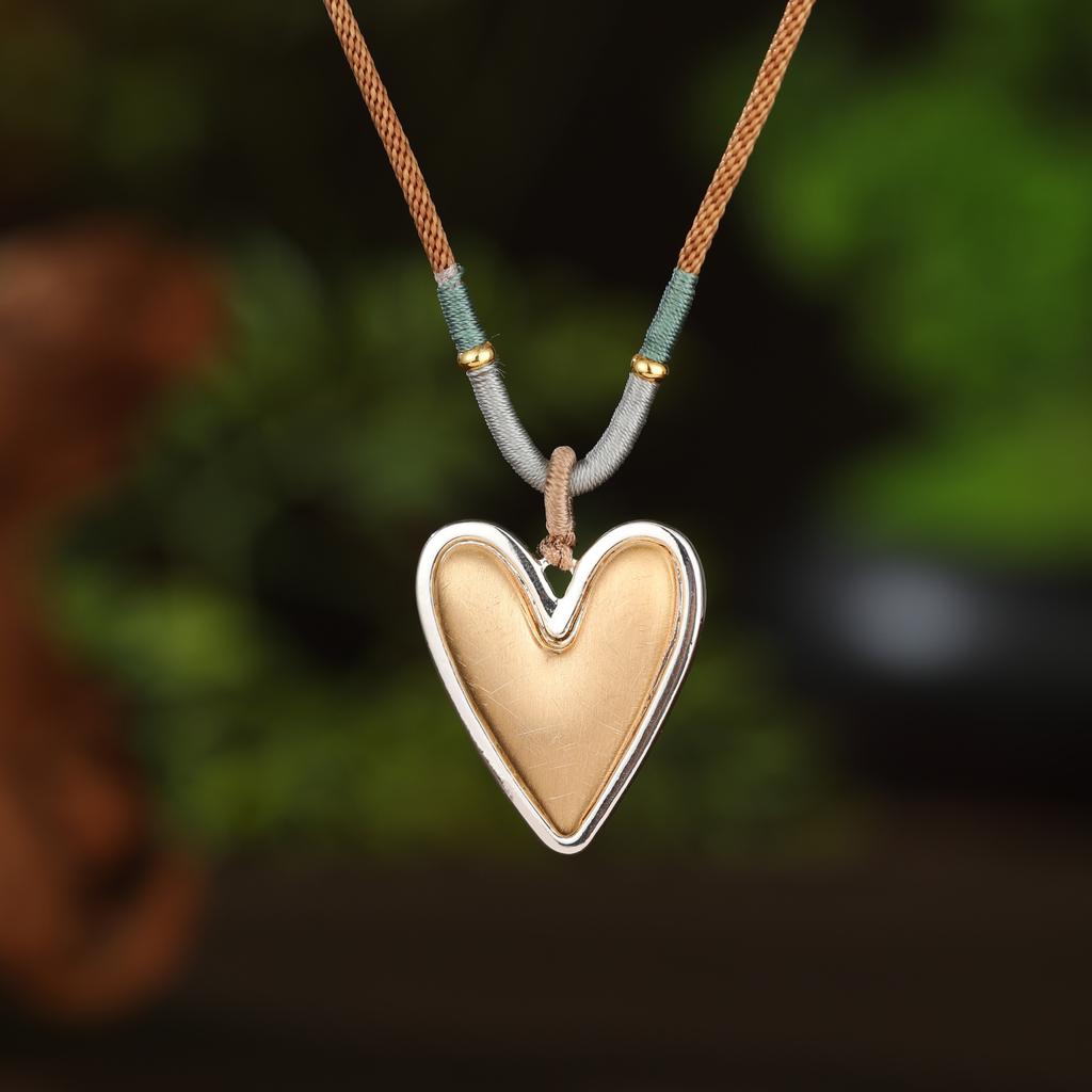 Pendentif long fleur géométrique creuse couleur émail, pendentif collier polyvalent en forme de cœur pour femme à sens élevé