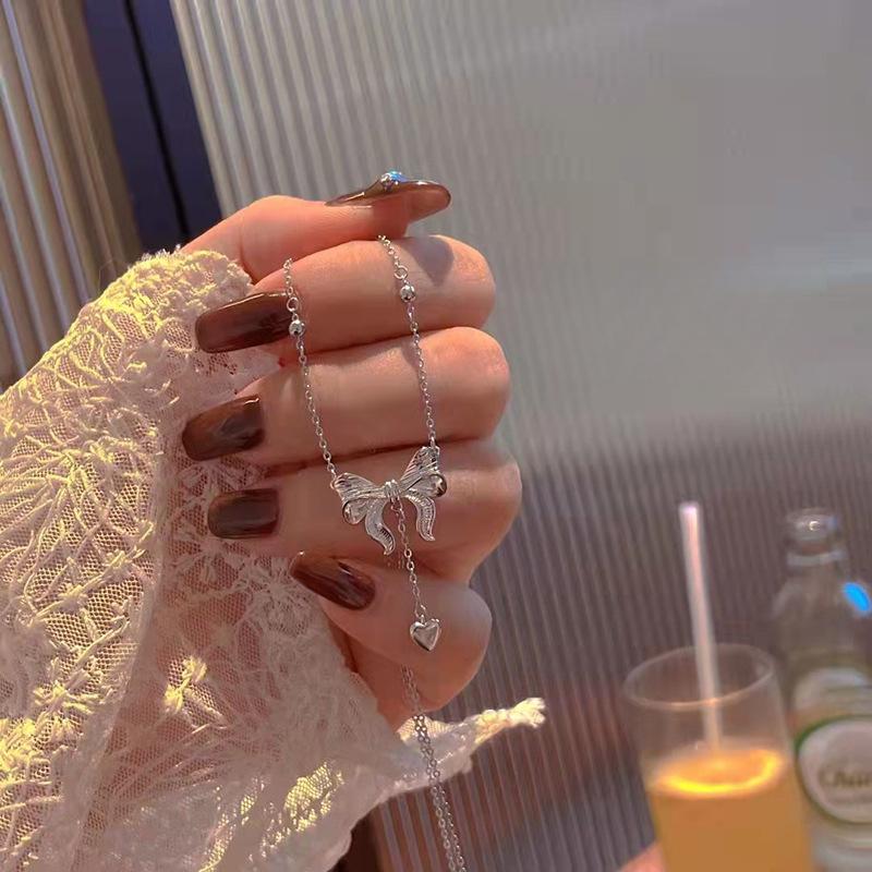 New Year's Escape Princess Necklace Women's Fashion Personalized Tassel Bowtie Pendant INS Small Crowd Collar Chain