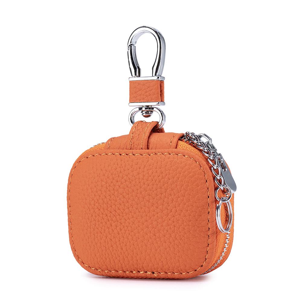 Genuine Leather Key Case with Bluetooth Earphone Pouch