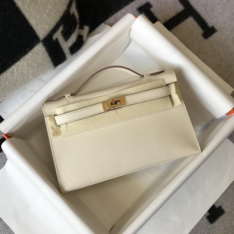 Nuova borsa da donna in vera pelle, mini generazione, alla moda, portatile, con palmo in pelle bovina di primo strato, 22 cm