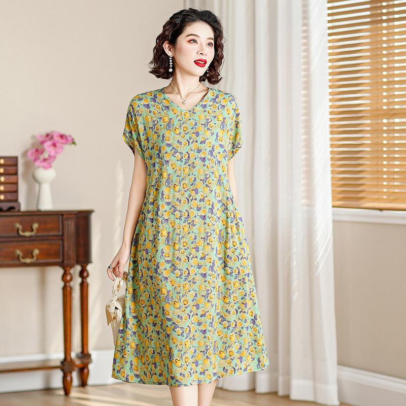 Nouvelle robe en coton et soie mode d'été pour femmes ample grande taille florale coton artificiel coton tempérament jupe moyenne et longue