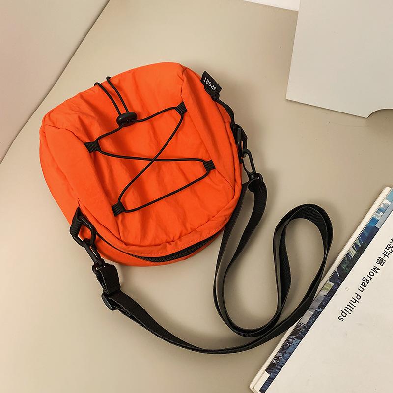 Crossbody bag women's contrasting color small bag ins trendy brand men's cross rope knot shell bag commuting versatile lightweight shoulder bag
