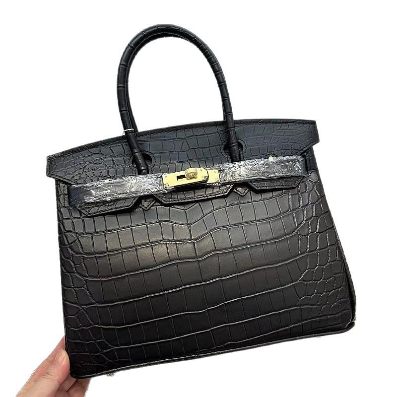 Pelle bovina primo strato motivo alligatore opaca portatile a spalla a tracolla borsa da donna premium transfrontaliera