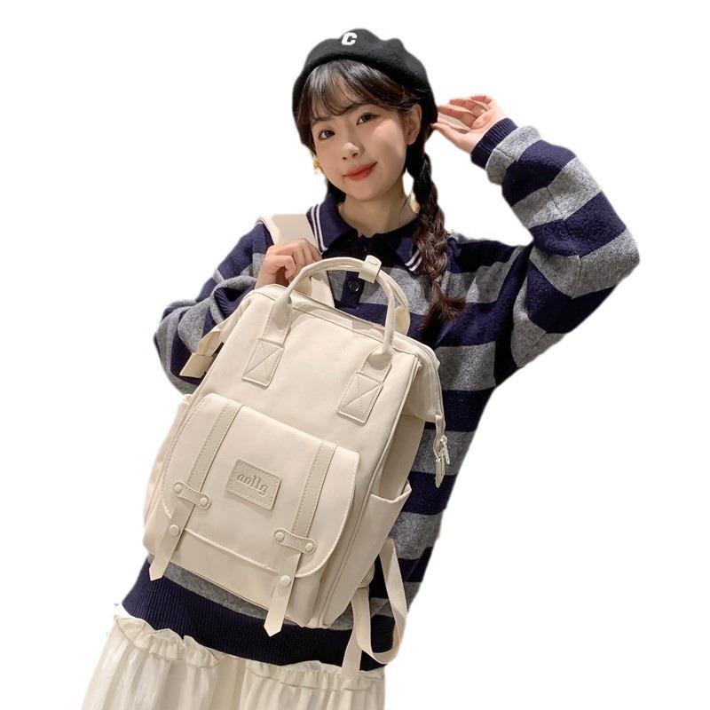Schoolbag new backpack simple female college bag lightweight versatile Japanese student schoolbag large capacity travel backpack