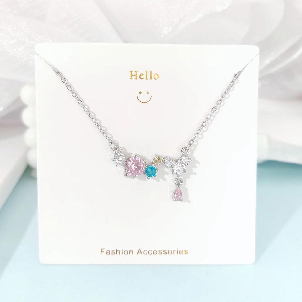 Pink Zircon Gourd Pendant Necklace with Floral Tassels - Titanium Steel Clavicle Chain for Women's Light Luxury.