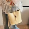 Korean new product, sweet and light color, gentle wind temperament bucket bag, women's commuting versatile and advanced messenger bag