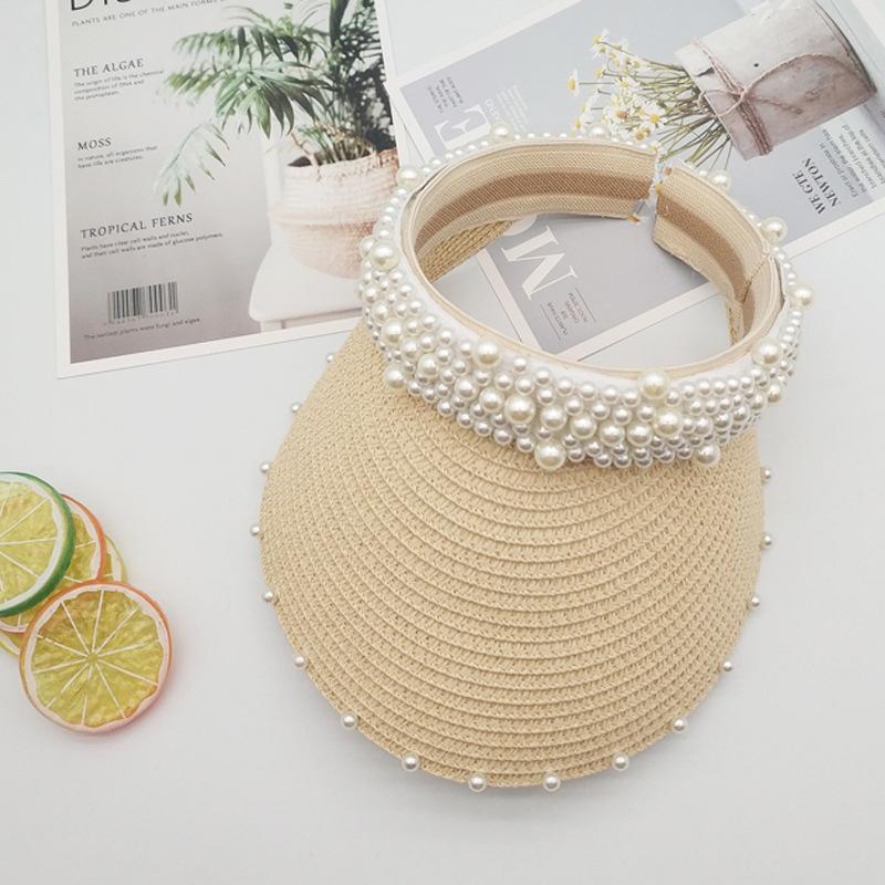 Straw hat spring and summer women's pearl fixed diamond empty top hat ins wind straw woven pearl strip big eaves sun protection monochrome sun hat