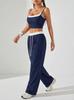 Completo Sportivo alla Moda da Donna a Vita Alta con Canotta e Pantaloni per l'Estate 2026