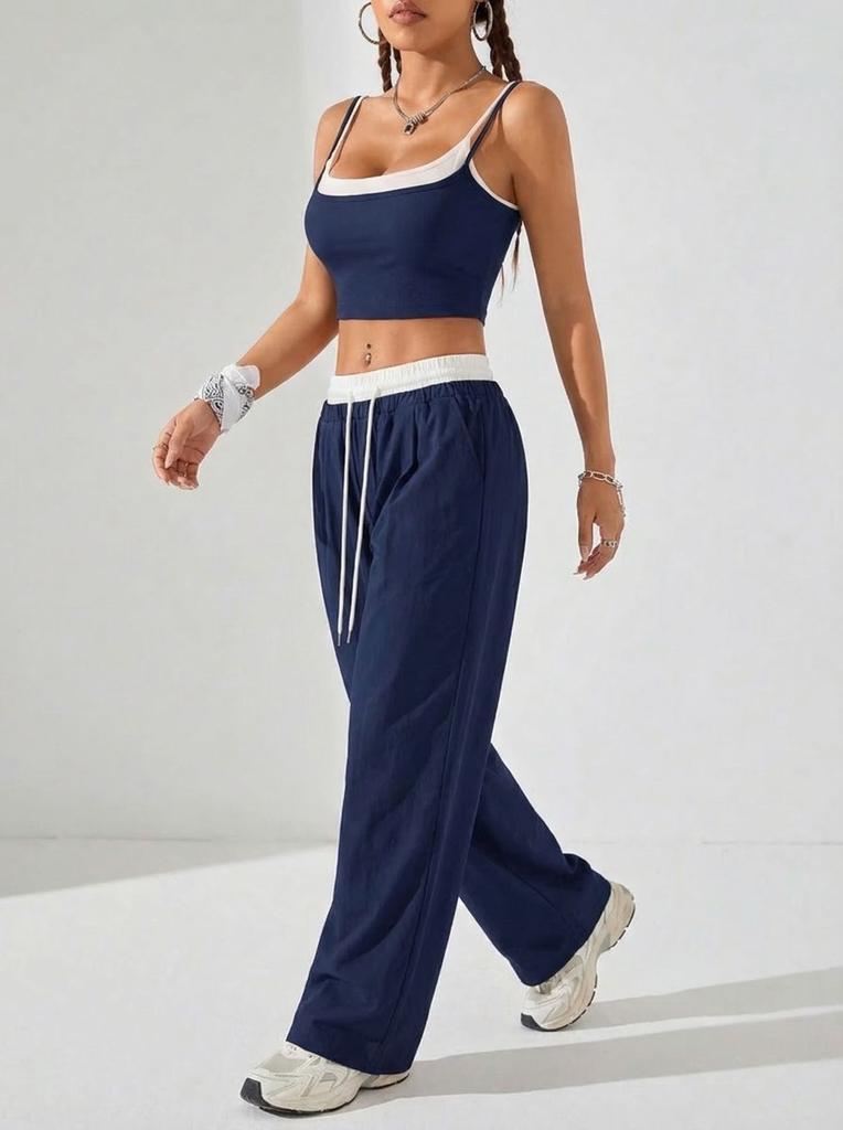 Completo Sportivo alla Moda da Donna a Vita Alta con Canotta e Pantaloni per l'Estate 2026