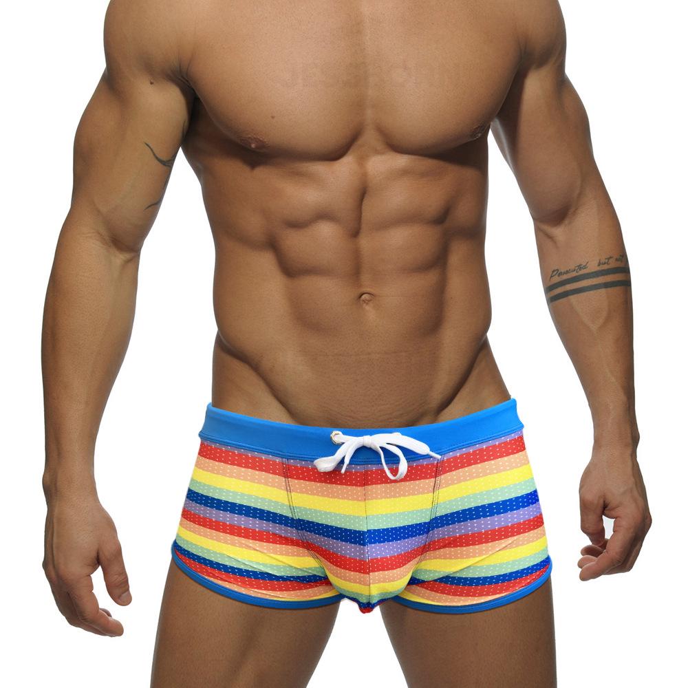

JESSBORN Men s Rainbow Stripe Swim Trunks with Pouch and Side Slits Large