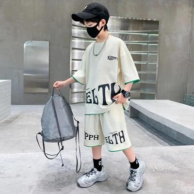 Set di abbigliamento estivo per bambini per ragazzi Stampa con lettere Tuta sportiva Abbigliamento per bambini e adolescenti T-shirt casual a maniche corte + pantaloncini Tuta Costume