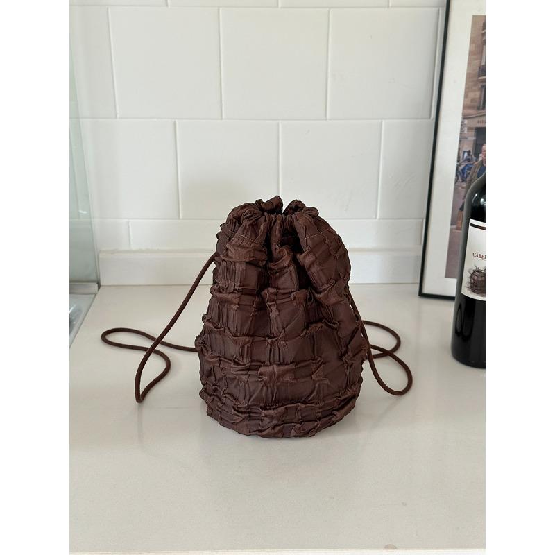 

New niche backpack girls backpack backpack girls casual bucket nylon pull rope bundle mouth bag кавовий