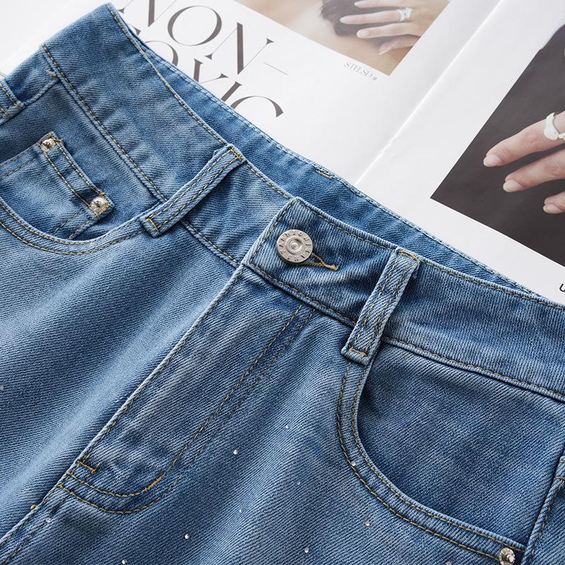 Blugi cu talie înaltă cu strasuri albastre și crac larg pentru femei - Colecția Vară 2025