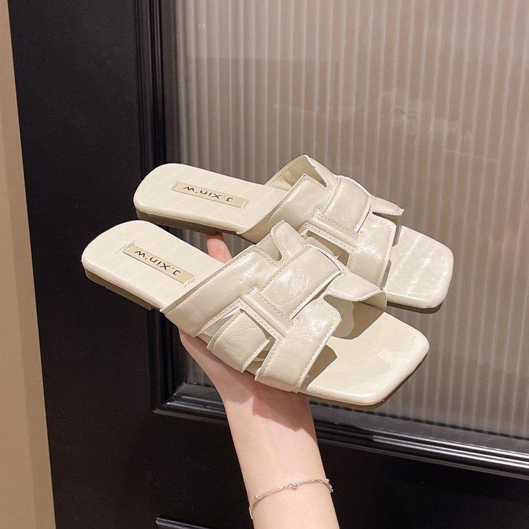 

2025 new soft leather soft-soled summer flat-bottomed slippers women s summer fashion outer wear summer one-word drag hot wind women s shoes 40