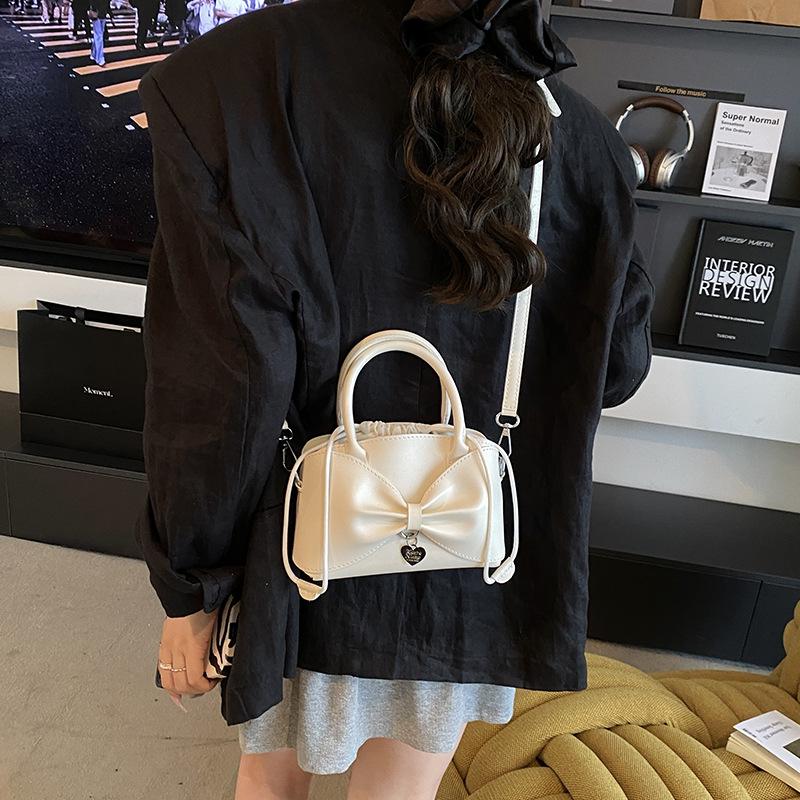 Niche Bow Small Bag Women's New Hand Bucket Bag Spring and Summer Retro Shoulder Messenger Bag