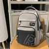High value trendy cool letter backpack couple contrasting colors simple and lightweight travel mountaineering backpack