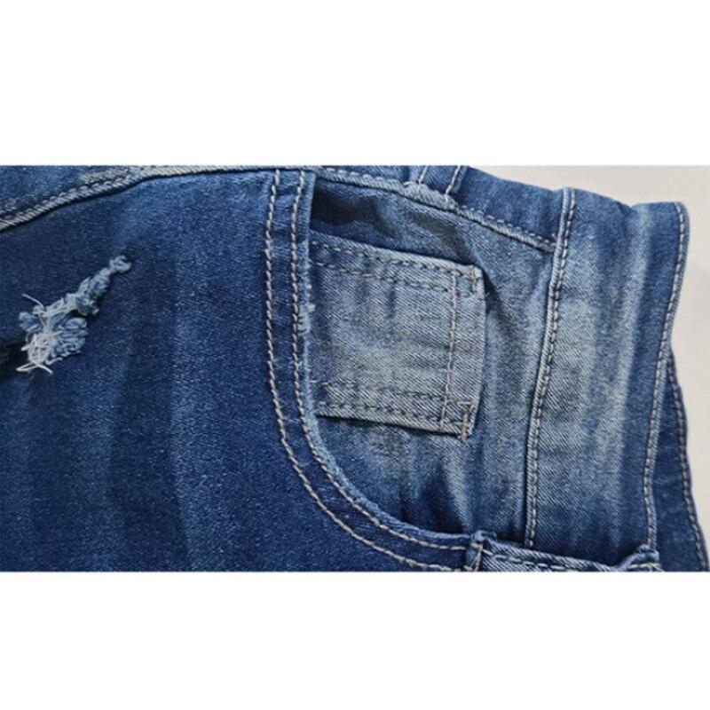 Sexy úzké džínové džíny se středním pasem pro ženy Kancelář Lady Vysoce pevné roztrhané džíny Jarní móda Dámské kalhoty 25656