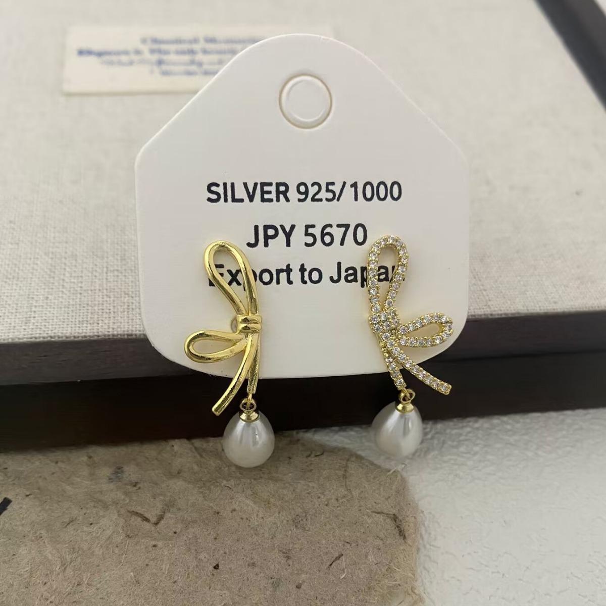 Elegant Gold Bow Pearl Stud Earrings with Unique Design & Versatile Style