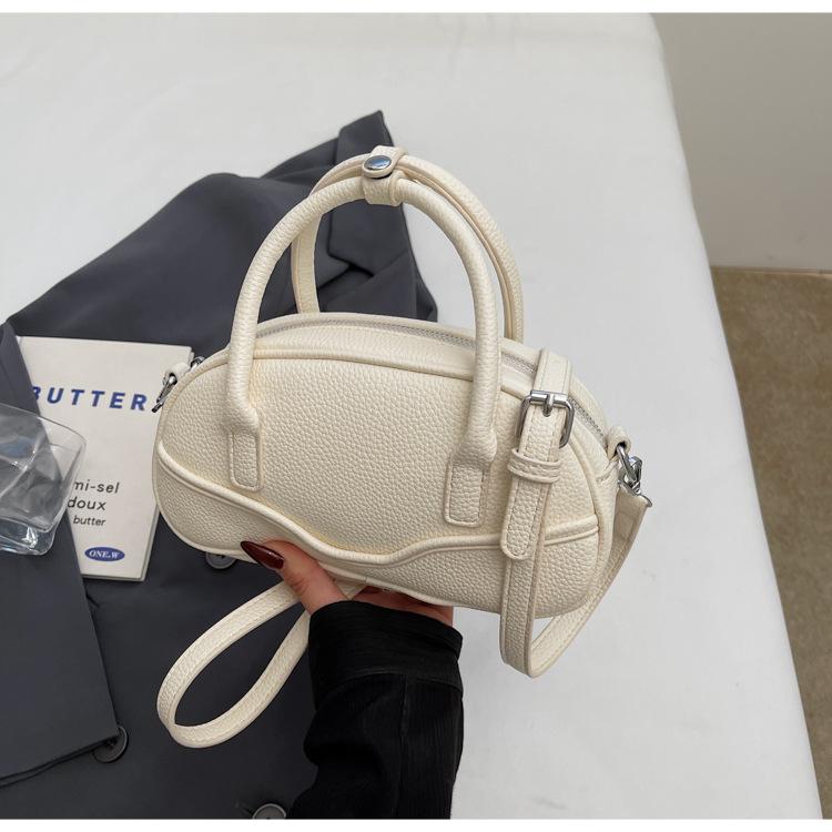 New textured portable bowling bag women's 2025 spring fashion simple shoulder messenger bag popular small square bag