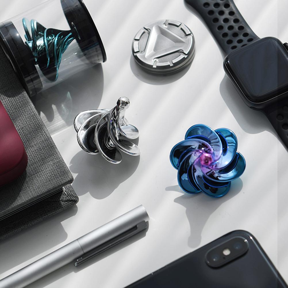 Exquisiter Kreisel und Fingerspielzeug für Kinder Windblasen Drehen Zappel-Desktop-Dekompression