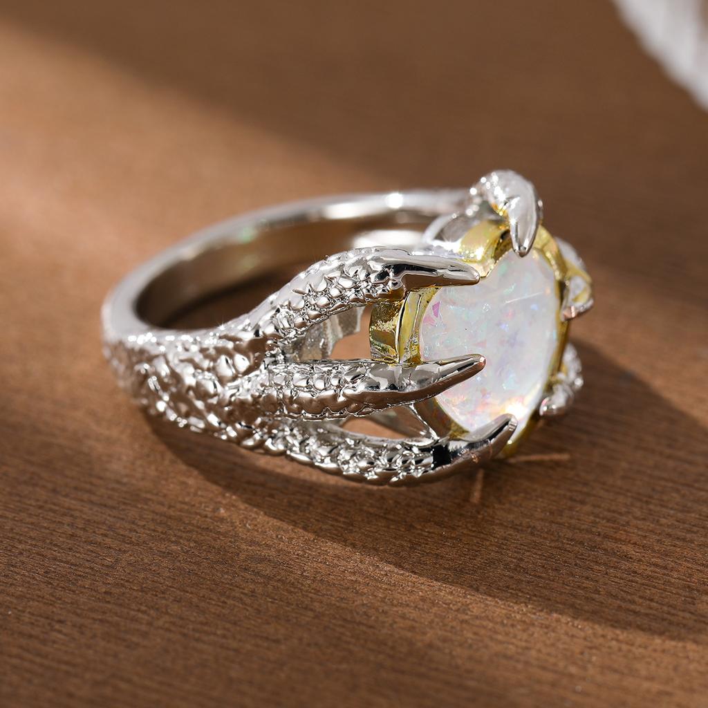 Fashion claw-set heart-shaped synthetic gemstone ring made of copper, for ladies' jewelry, suitable for parties and banquets.