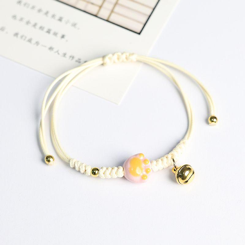 

Свежий мультяшный милый браслет с колокольчиком в виде кошачьей лапки, керамический браслет Цзиндэчжэнь, девичий стиль, плетеный ручной ремешок для пары Pink