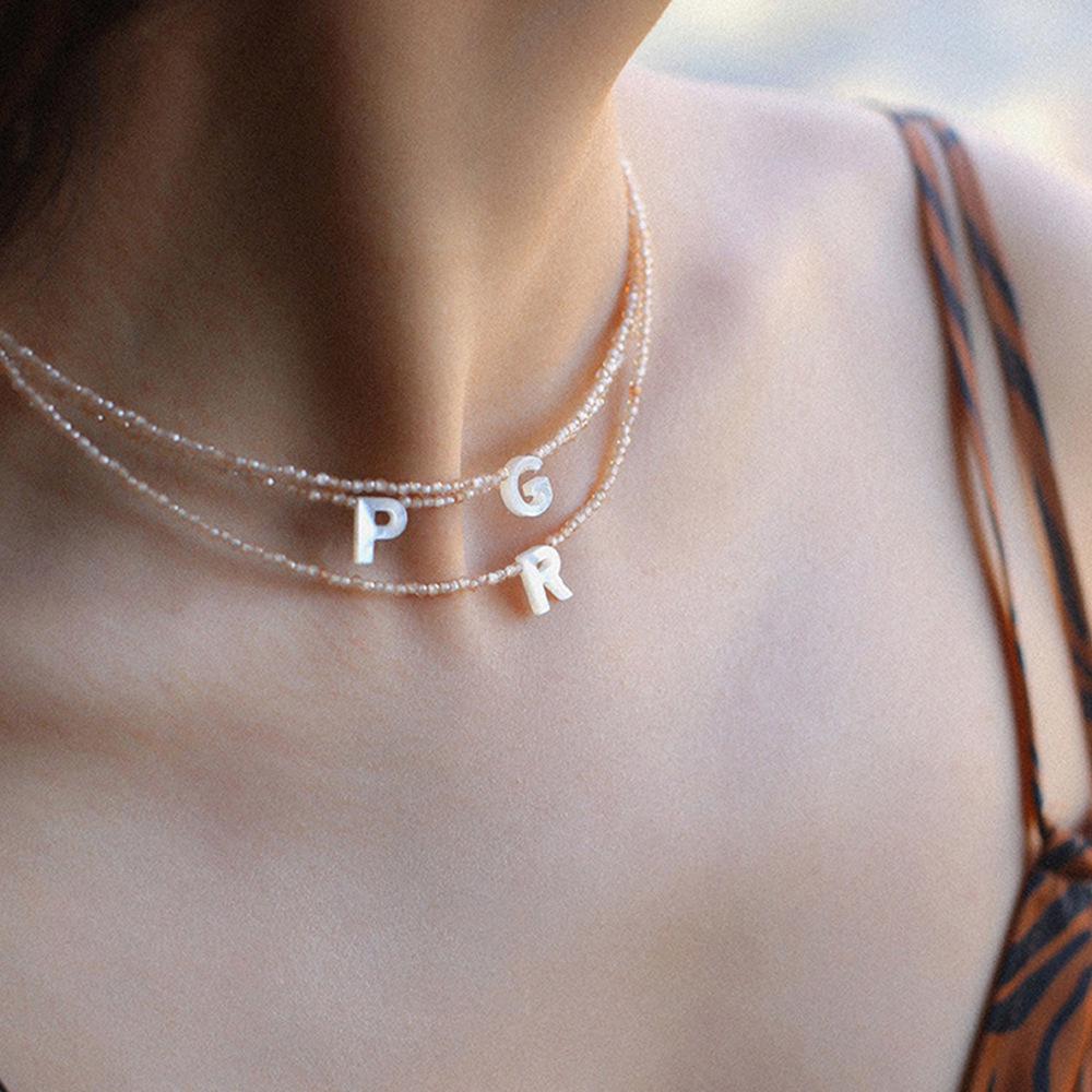 Elegant 2m Zircon Beaded Clavicle Chain: 26-Letter Deep Sea Shell Necklace for Women.