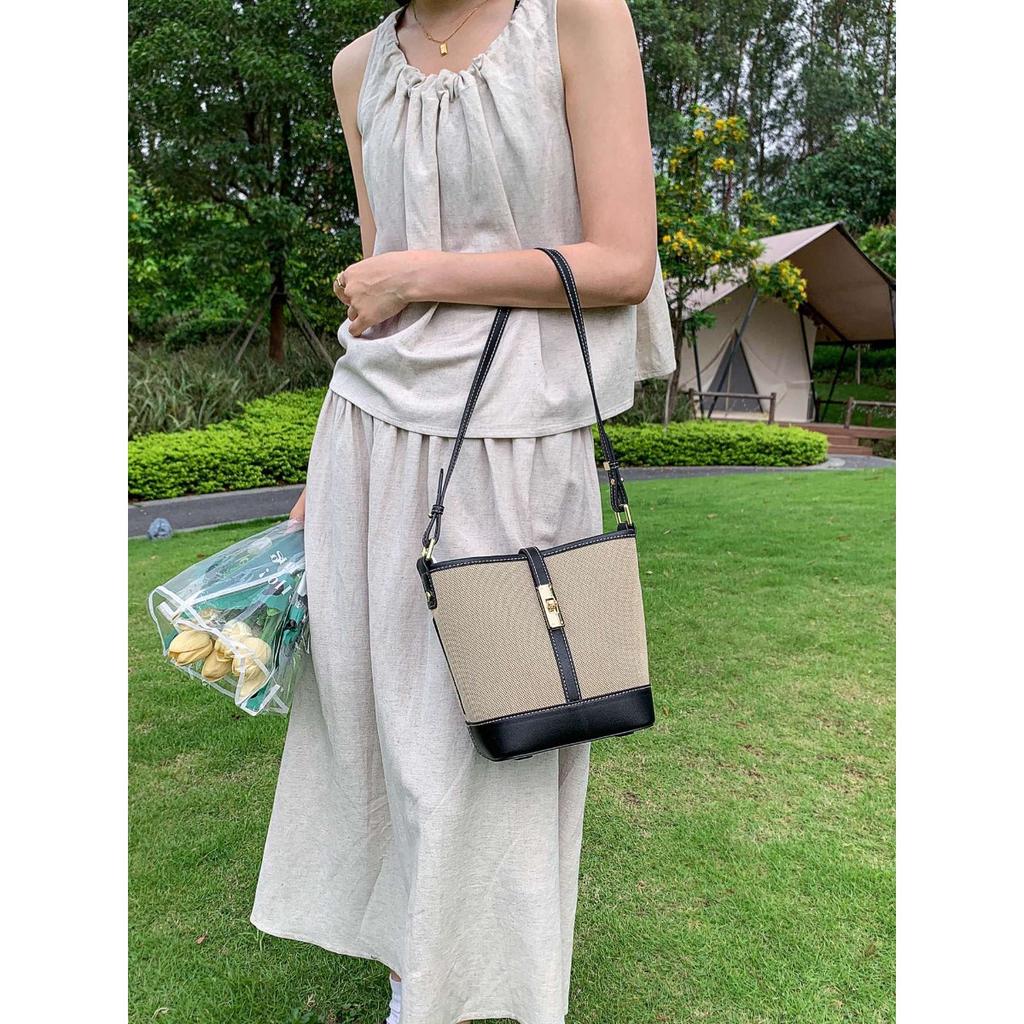 Cowhide canvas splicing bucket bag women's 2025 summer shoulder oblique span bag casual versatile underarm bag Korean version tide