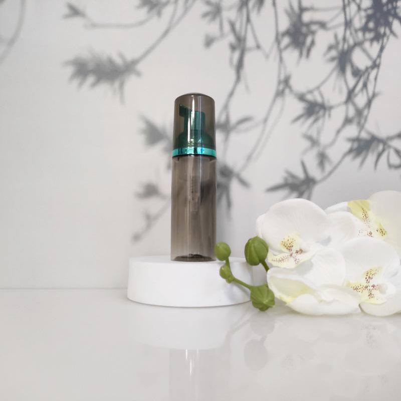 Available 60ml Transparent Black Foam Mousse Bottle for Face Wash and Travel-friendly Cosmetic Packaging.