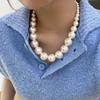 Real gold electroplated pearl and diamond-inlaid floral necklace, niche, fashionable, versatile collarbone chain, elegant and high-end accessory