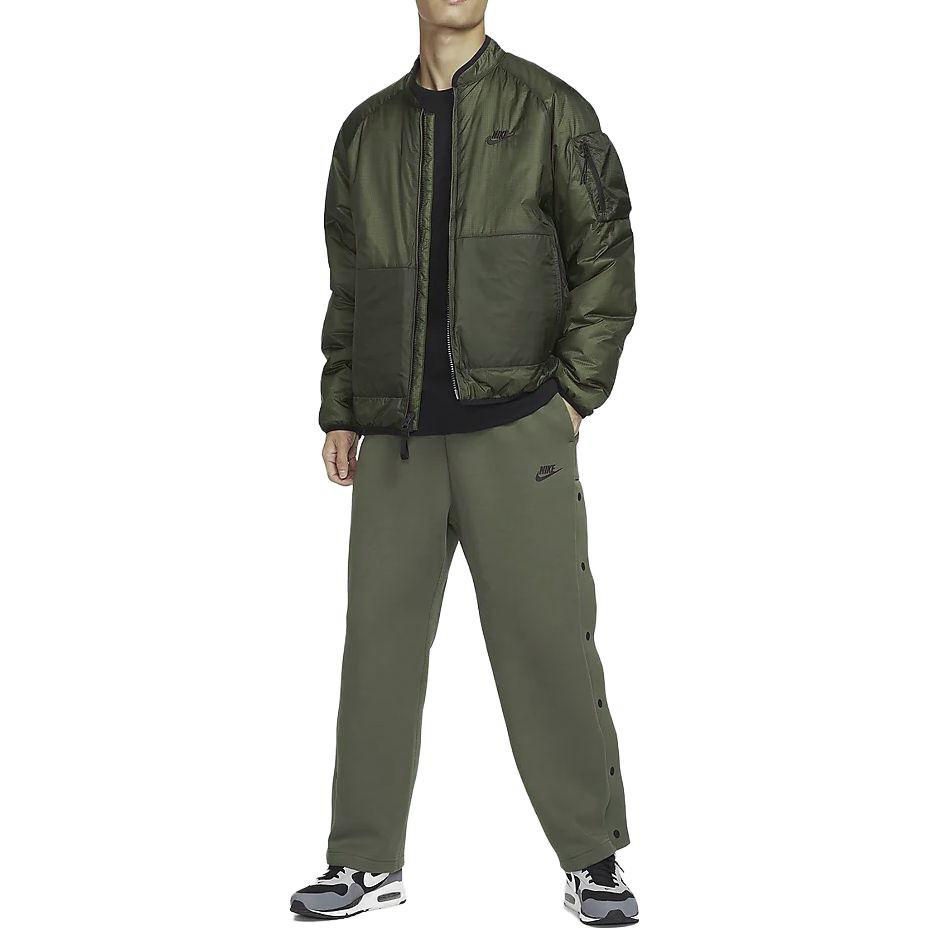 Nike Spodnie sportowe dzianinowe Tech Fleece w jednolitym kolorze, luźny krój, zapinane na zatrzaski, męskie, dół, średni oliwkowozielony FB8015-222