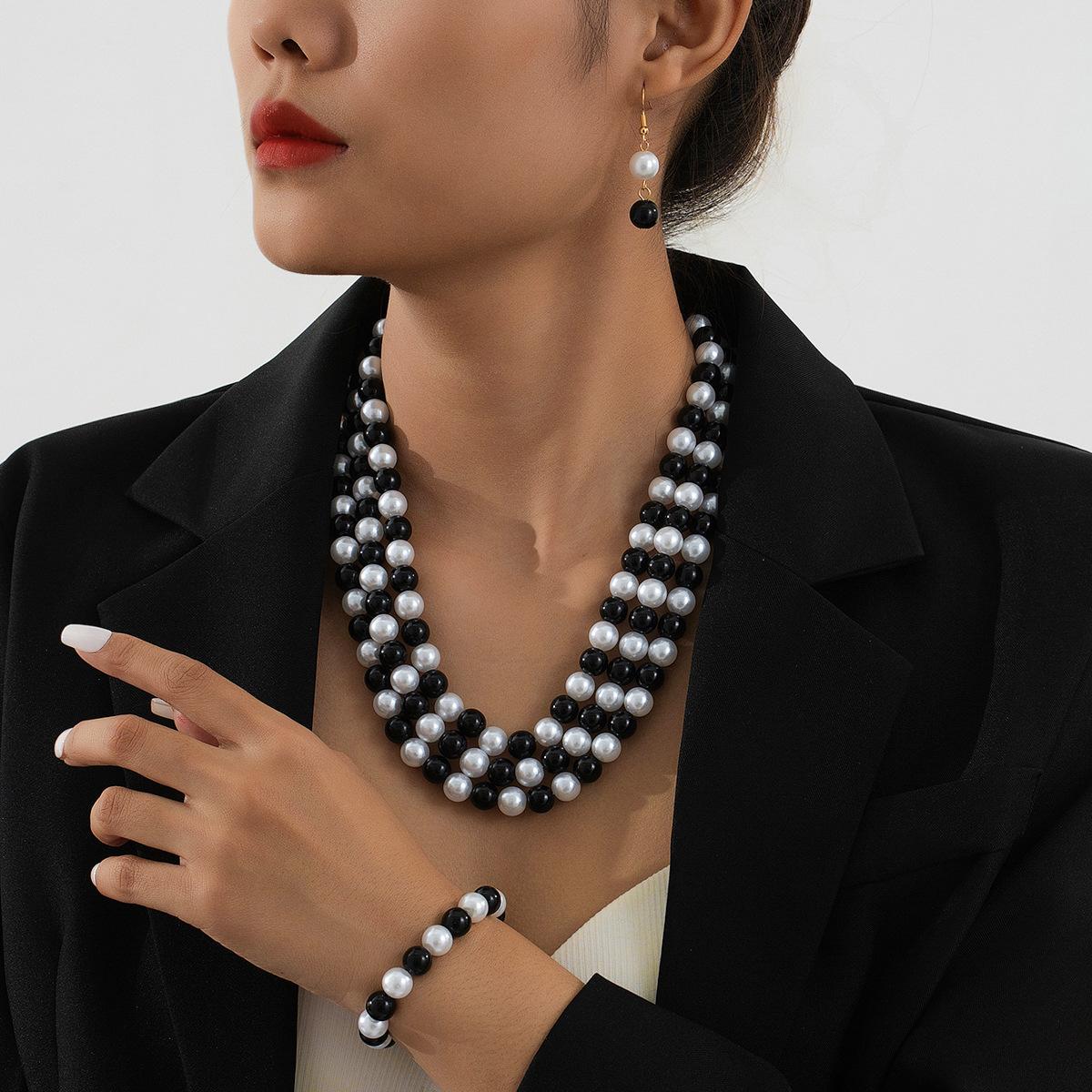 

Изысканный дизайн Подчеркивающий Черно-белый Дизайн из Имитации Жемчуга Серьги Браслет Ожерелье Набор