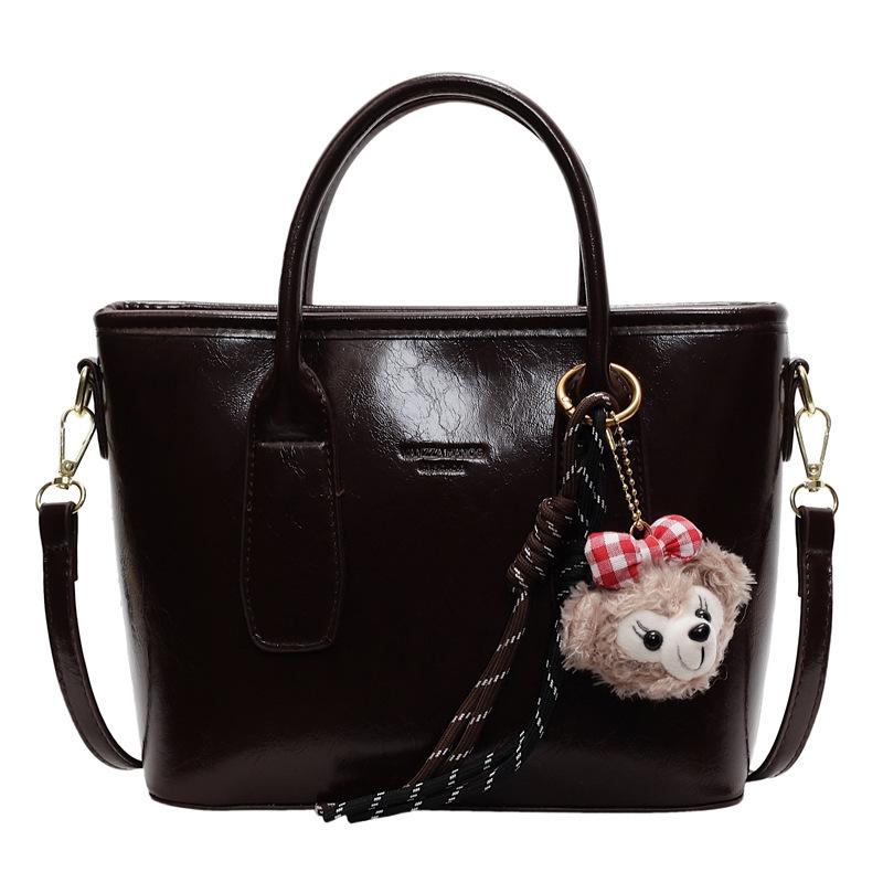 Simple and fashionable handbag spring new retro texture bucket bag solid color commuter shoulder messenger bag