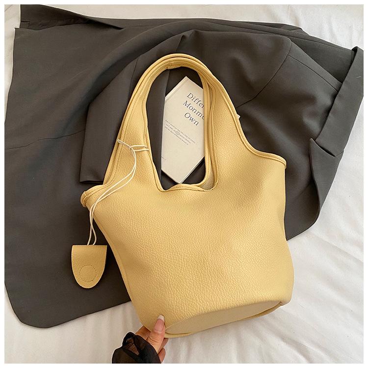 

2025 new Korean version of literary shoulder bag versatile class bucket bag niche design large capacity child and mother tote bag