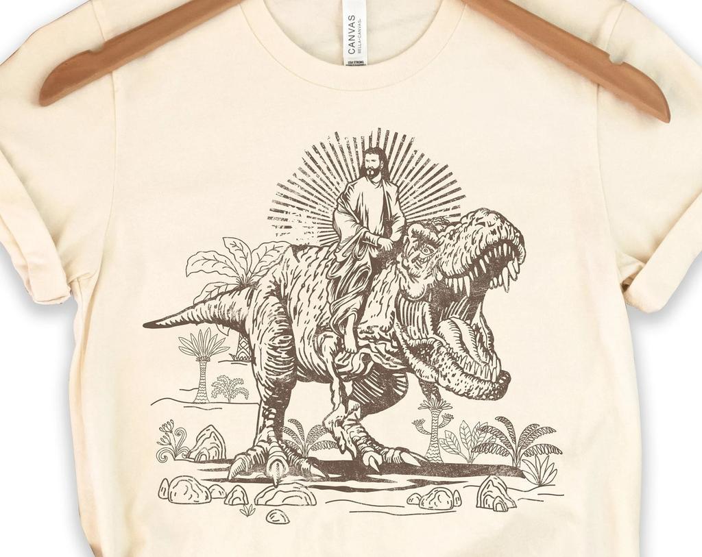 Jesus Riding T Rex Dinosaur Shirt | Cool Men Tee Christ T-shirt Funny Meme Shirts Tyrannosaurus Rex Tshirt Animal Men Shirts
