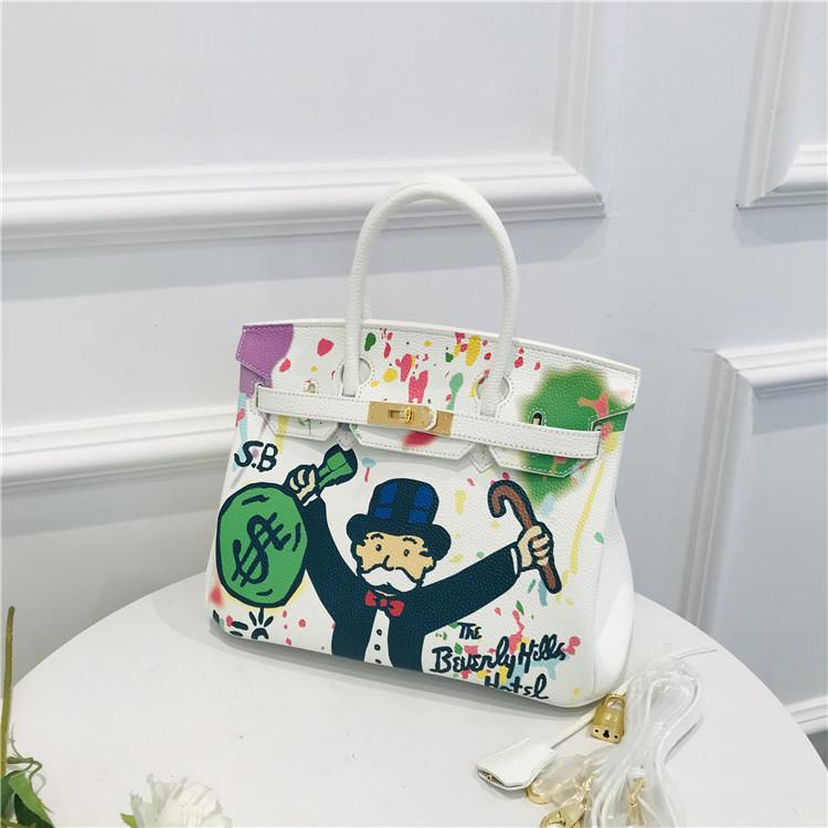 2021 New platinum bag first layer cowhide painted spray painting graffiti bag portable shoulder messenger bag personalized women's bag tide