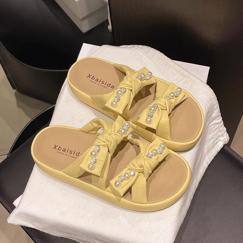 

thick-soled pearl slippers for women in summer 2025, new fashion bow muffin open-toed cool slippers for women 40