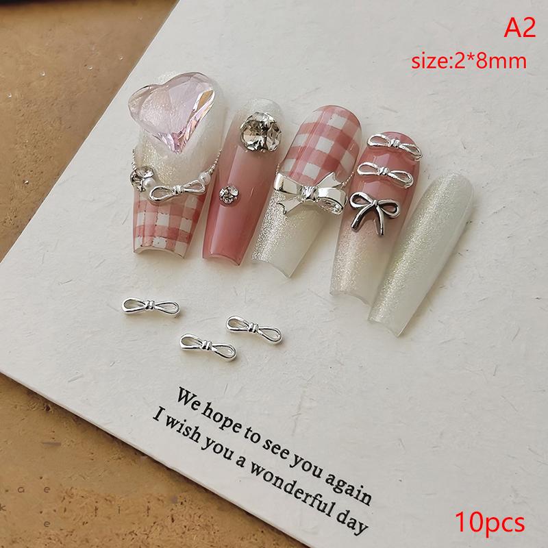 

10Pcs Kawaii 3D Silver Gold Bowknot Bowknot Bowknot Ballerina Girl Alloy Pearl Nail Art Diy Nails Accessories Decoration Charms
