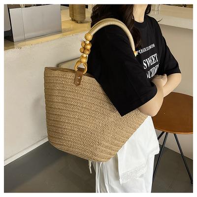 Bolsa de mão grande capacidade tecida com senso de design estilo férias na praia feminina versátil cor sólida casual personalidade bolsa de ombro