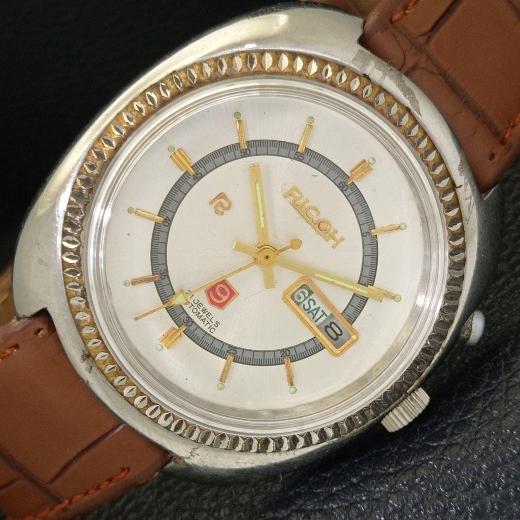 

ЯПОНИЯ ВИНТАЖНЫЕ МУЖСКИЕ АВТОМАТИЧЕСКИЕ ЧАСЫ RICOH R31 С СЕРЕБРИСТЫМ ЦИФЕРБЛАТОМ a701944-5 R207-a701944