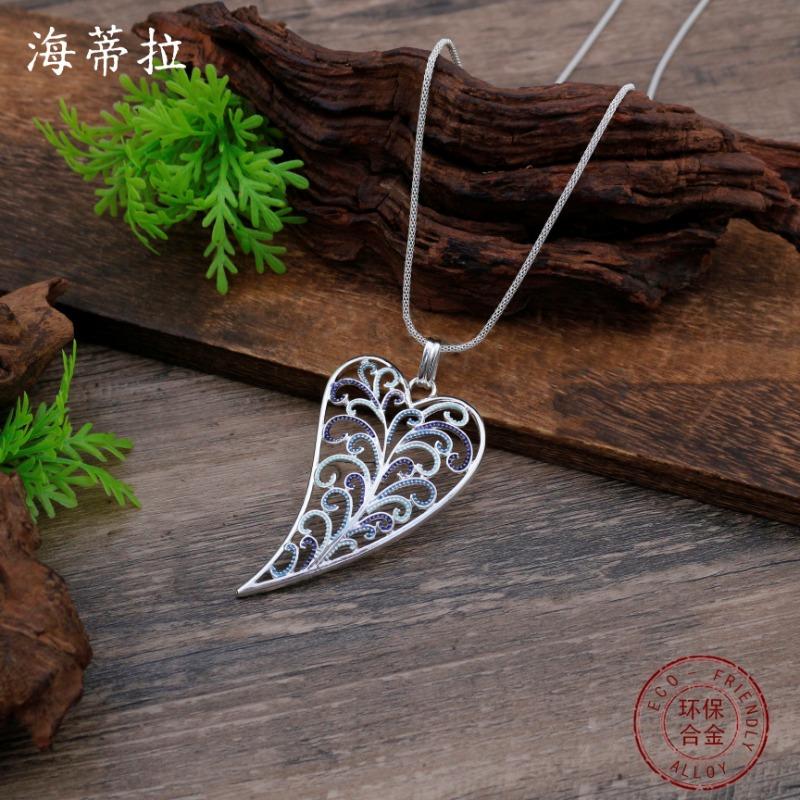 New enamel color hollow love long pendant, women's creative exaggerated heart-shaped versatile long necklace