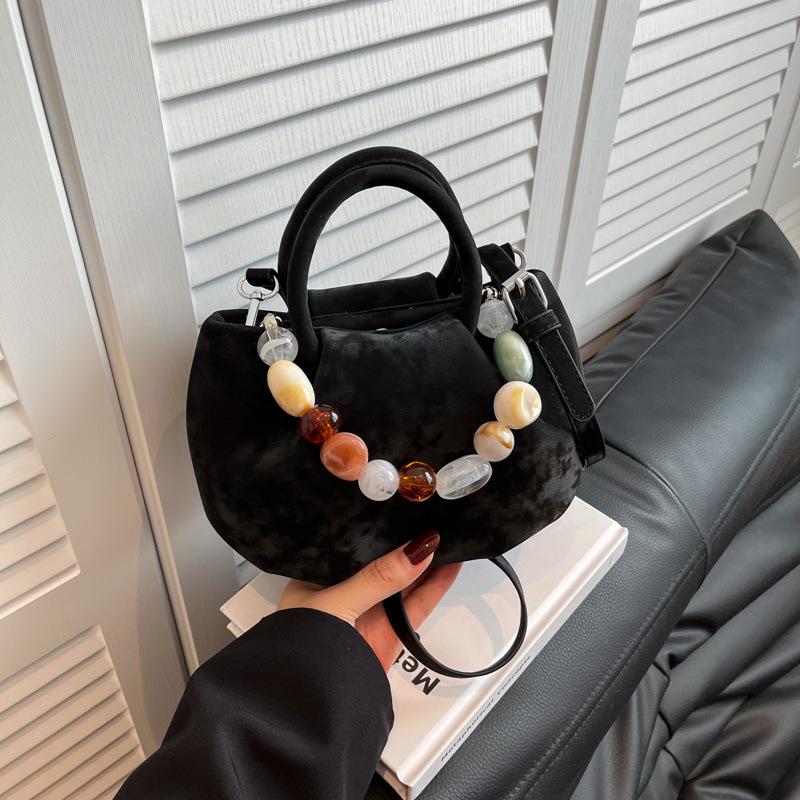 Niche bag women's new summer versatile messenger bag casual pleated portable bucket bag