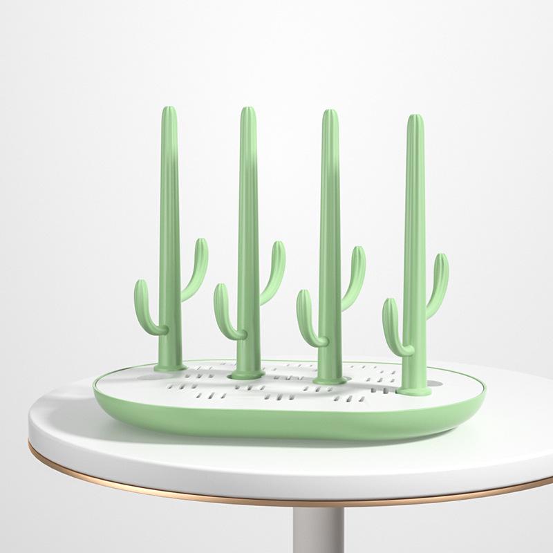 Versatile Baby Bottle Holder & Detachable Drying Rack with Pacifier Slot.