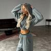 2026 new cross-border casual women's suit features color matching rough edge long-sleeved jacket lace-up trousers two-piece set