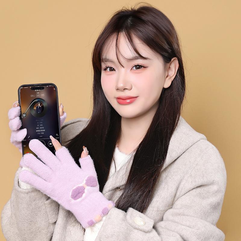 Wool gloves show two fingers, women keep warm in winter, knit for cold protection, draw and write, students play with mobile phones with two fingers
