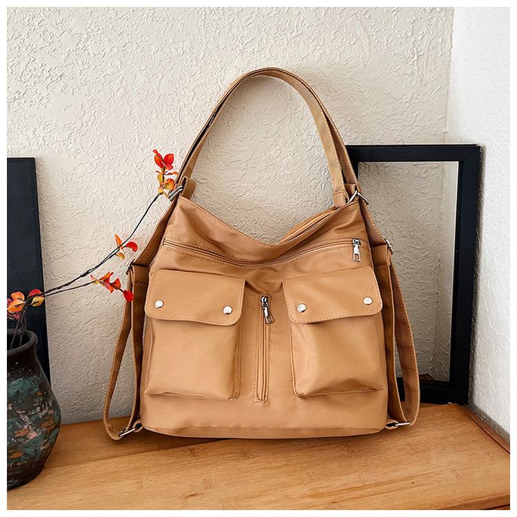 

Простая личность универсальная женская сумка-тоут многоцелевая повседневная на плечо сумка-мессенджер внешняя торговля многофункциональная трехцелевая холщовая сумка темно-коричневого