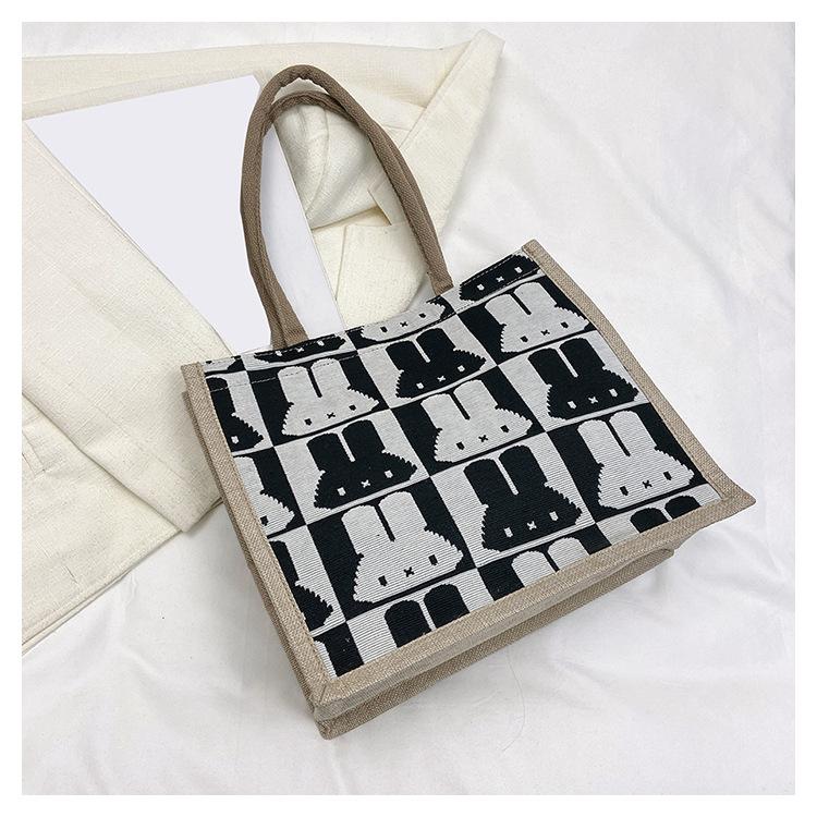 

2025 новая сумка большой вместимости женская модная милая с кроликом хлопковая и льняная ручная сумка через плечо для работы, сумка-тоут для поездок на работу чёрный