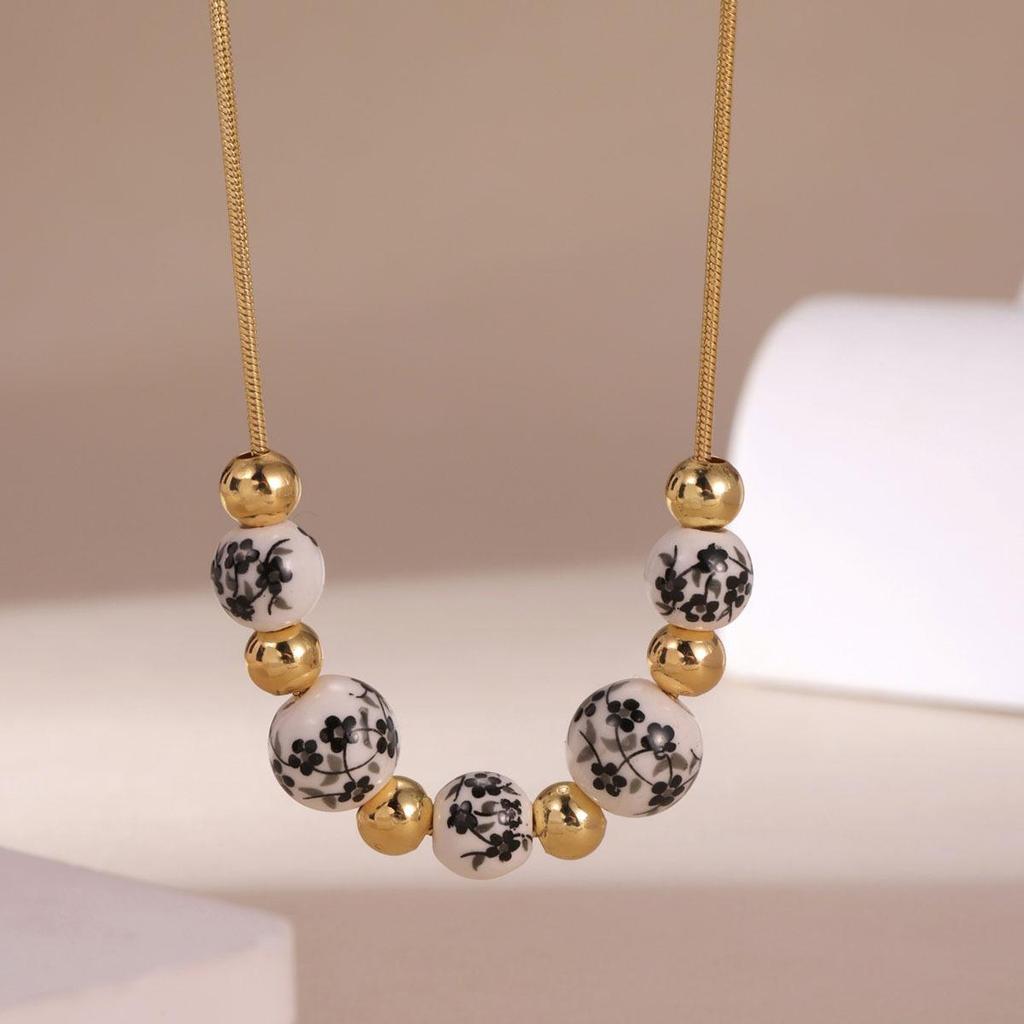 Retro blau-weiße Porzellanperlenkette Damenlegierungskette Europäische und amerikanische Mode Musterkette